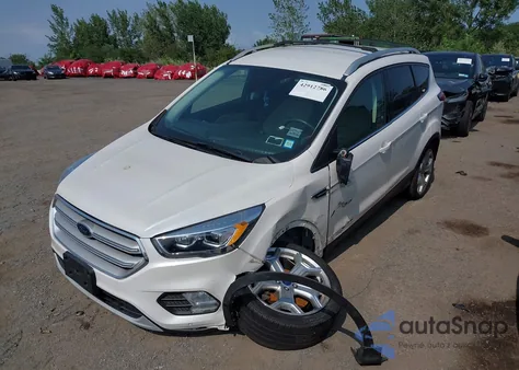 2019 Ford Escape Titanium z USA, uszkodzony, nr VIN 1FMCU9J98KUB43238
